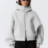 Oversized-Kapuzenpullover mit Trichterkragen und Reißverschluss – Grau meliert Oversized-Kapuzenpullover mit Trichterkragen und Reißverschluss – Grau meliert