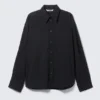 Oversized-Popeline-Hemd mit Knopfleiste – Schwarz – Dunkelblaue Streifen Oversized-Popeline-Hemd mit Knopfleiste – Schwarz – Dunkelblaue Streifen