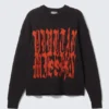 Oversized-Pullover aus Baumwollstrick mit Print – Schwarz Oversized-Pullover aus Baumwollstrick mit Print – Schwarz