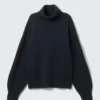 Oversized-Rollkragen-Pullover aus Wolle – Dunkelblau Oversized-Rollkragen-Pullover aus Wolle – Dunkelblau