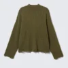 Pullover mit geripptem Rollkragen und Used-Look – Dunkelgrün Pullover mit geripptem Rollkragen und Used-Look – Dunkelgrün