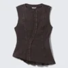 Ärmelloses, asymmetrisches Peplum-Oberteil – gewaschenes Schwarz Ärmelloses, asymmetrisches Peplum-Oberteil – gewaschenes Schwarz