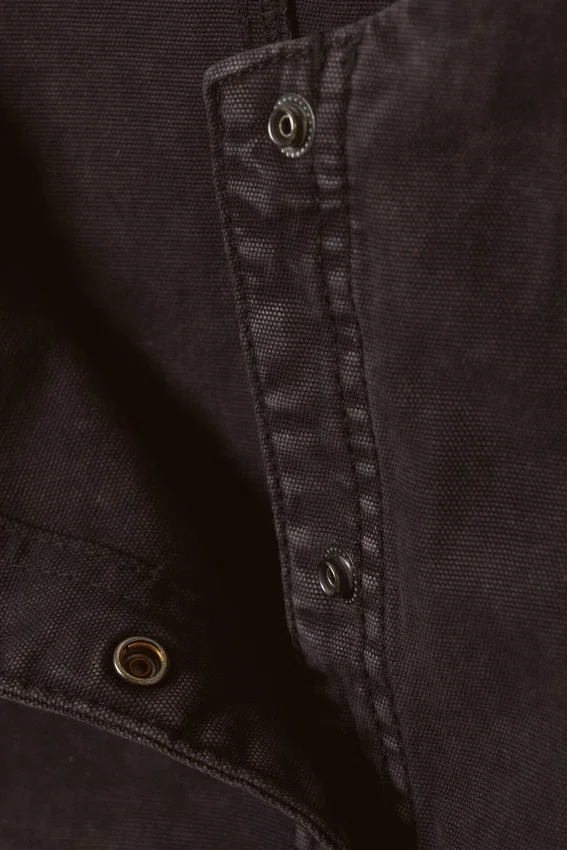 Ärmelloses, asymmetrisches Peplum-Oberteil – gewaschenes Schwarz Ärmelloses, asymmetrisches Peplum-Oberteil – gewaschenes Schwarz