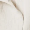 Ärmelloses, asymmetrisches Peplum-Top – Ecru Ärmelloses, asymmetrisches Peplum-Top – Ecru
