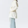 Rosabel Lockerer Einreiher-Trenchcoat – Weiß Rosabel Lockerer Einreiher-Trenchcoat – Weiß