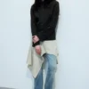 Schlanke Knopfjacke – schwarz mit Nadelstreifen Schlanke Knopfjacke – schwarz mit Nadelstreifen