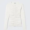 Schmal geschnittene Strickjacke mit Rüschen und Knopfleiste – Off-White Schmal geschnittene Strickjacke mit Rüschen und Knopfleiste – Off-White