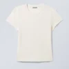 Schmal geschnittenes Baumwoll-T-Shirt mit kurzen Ärmeln – Off-White Schmal geschnittenes Baumwoll-T-Shirt mit kurzen Ärmeln – Off-White
