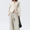Slim-Fit-Bluse mit Struktur – Hellbeige Slim-Fit-Bluse mit Struktur – Hellbeige