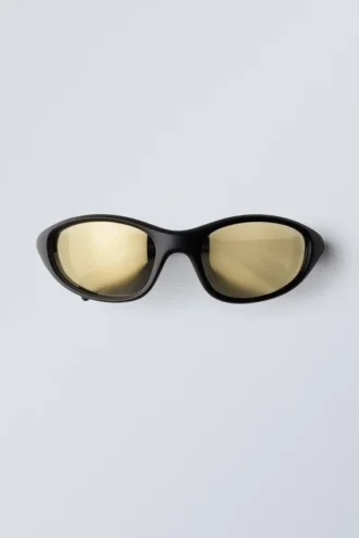 Sportliche ovale Sonnenbrille – Schwarz mit goldenen Gläsern