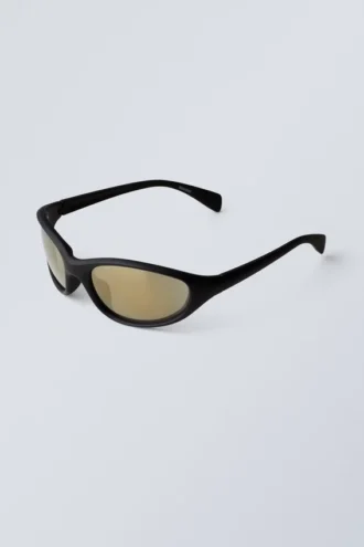 Sportliche ovale Sonnenbrille – Schwarz mit goldenen Gläsern