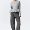 Strickpullover mit Volants am Saum – Grau meliert Strickpullover mit Volants am Saum – Grau meliert