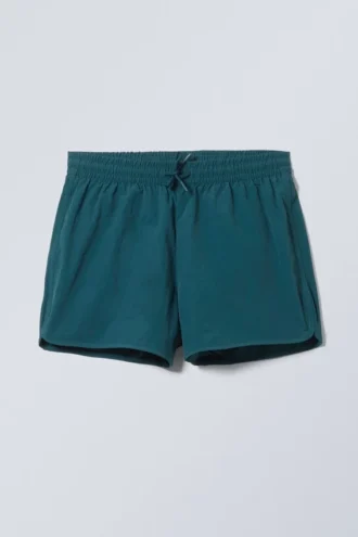 Strukturierte Badeshorts in mittlerer Länge – Petrol