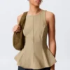 Tailliertes Nylon-Peplum-Oberteil – Beige Tailliertes Nylon-Peplum-Oberteil – Beige