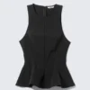 Tailliertes Nylon-Peplum-Top – Schwarz Tailliertes Nylon-Peplum-Top – Schwarz