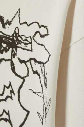Tolles, kastenförmiges Langarmshirt mit Print – Staubweiß – Shaky Monster