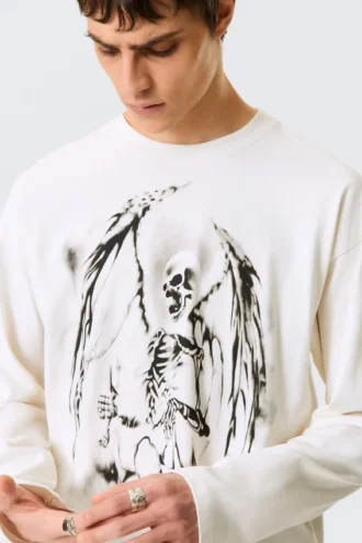 Tolles, kastenförmiges Langarmshirt mit Print und langen Ärmeln – Weiß – Skeleton Angel