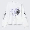 Tolles, kastenförmiges Langarmshirt mit Print – Weiß – Airways Tolles, kastenförmiges Langarmshirt mit Print – Weiß – Airways