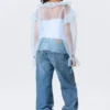 Transparente Bluse mit Rüschen und V-Ausschnitt – Hellblau Transparente Bluse mit Rüschen und V-Ausschnitt – Hellblau
