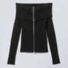 Vanna Off-Shoulder-Strickjacke mit Reißverschluss – Schwarz Vanna Off-Shoulder-Strickjacke mit Reißverschluss – Schwarz