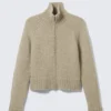 Weiche, figurbetonte Strickjacke mit Reißverschluss – Beige Melange Weiche, figurbetonte Strickjacke mit Reißverschluss – Beige Melange