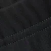 Weiche, tief sitzende Hose mit weitem Bein – gewaschenes Schwarz Weiche, tief sitzende Hose mit weitem Bein – gewaschenes Schwarz