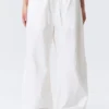 Weit geschnittene Hose mit niedriger Taille und Waschoptik – Weiß Weit geschnittene Hose mit niedriger Taille und Waschoptik – Weiß