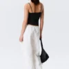Weit geschnittene Hose mit niedriger Taille und Waschoptik – Weiß Weit geschnittene Hose mit niedriger Taille und Waschoptik – Weiß