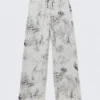 Weit geschnittene Jogginghose aus Baumwolle – Grau meliert – Scribble-Print Weit geschnittene Jogginghose aus Baumwolle – Grau meliert – Scribble-Print