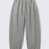 Weit geschnittene Jogginghose aus Baumwollfleece – Grau meliert Weit geschnittene Jogginghose aus Baumwollfleece – Grau meliert
