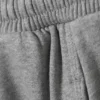Weit geschnittene Jogginghose aus Baumwollfleece – Grau meliert Weit geschnittene Jogginghose aus Baumwollfleece – Grau meliert