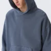 Weit geschnittener Kapuzenpullover aus schwerer Baumwolle – gewaschen, dunkelblau Weit geschnittener Kapuzenpullover aus schwerer Baumwolle – gewaschen, dunkelblau