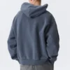 Weit geschnittener Kapuzenpullover aus schwerer Baumwolle – gewaschen, dunkelblau Weit geschnittener Kapuzenpullover aus schwerer Baumwolle – gewaschen, dunkelblau
