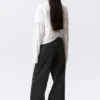 Weite Low-Rise-Jeans mit weitem Saum – Elegie Black – Schwarz Weite Low-Rise-Jeans mit weitem Saum – Elegie Black – Schwarz