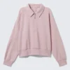 Weites Polo-Sweatshirt mit halbem Reißverschluss – Hellrosa Weites Polo-Sweatshirt mit halbem Reißverschluss – Hellrosa