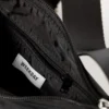 Zari Handtasche – Schwarz mit Reißverschluss Zari Handtasche – Schwarz mit Reißverschluss