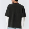 Zeilagiges Baumwoll-T-Shirt – Schwarz & Weiß Zeilagiges Baumwoll-T-Shirt – Schwarz & Weiß